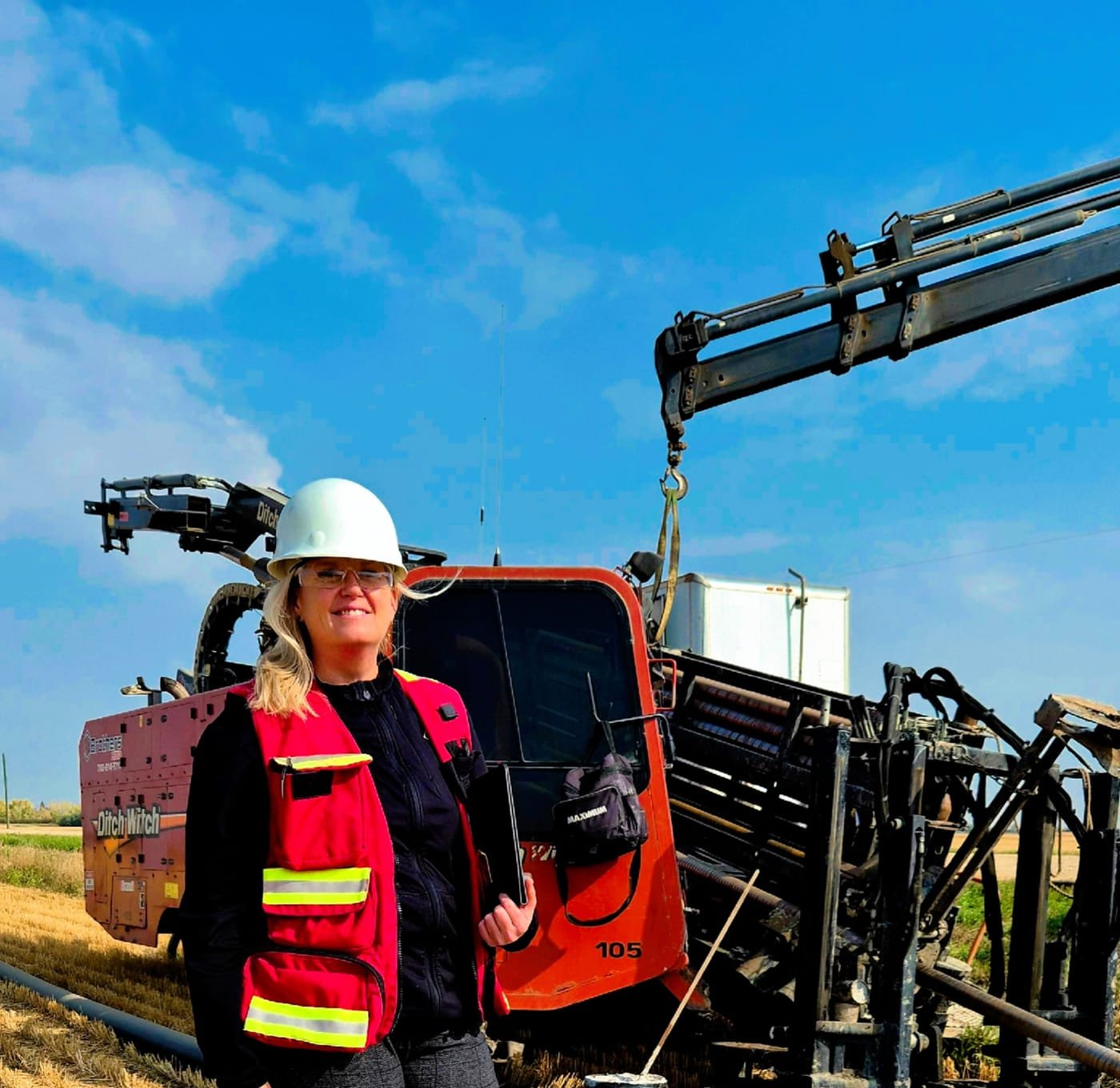 G-Force Safety Solutions safety professional in personal protective equipment at an industrial worksite in Alberta